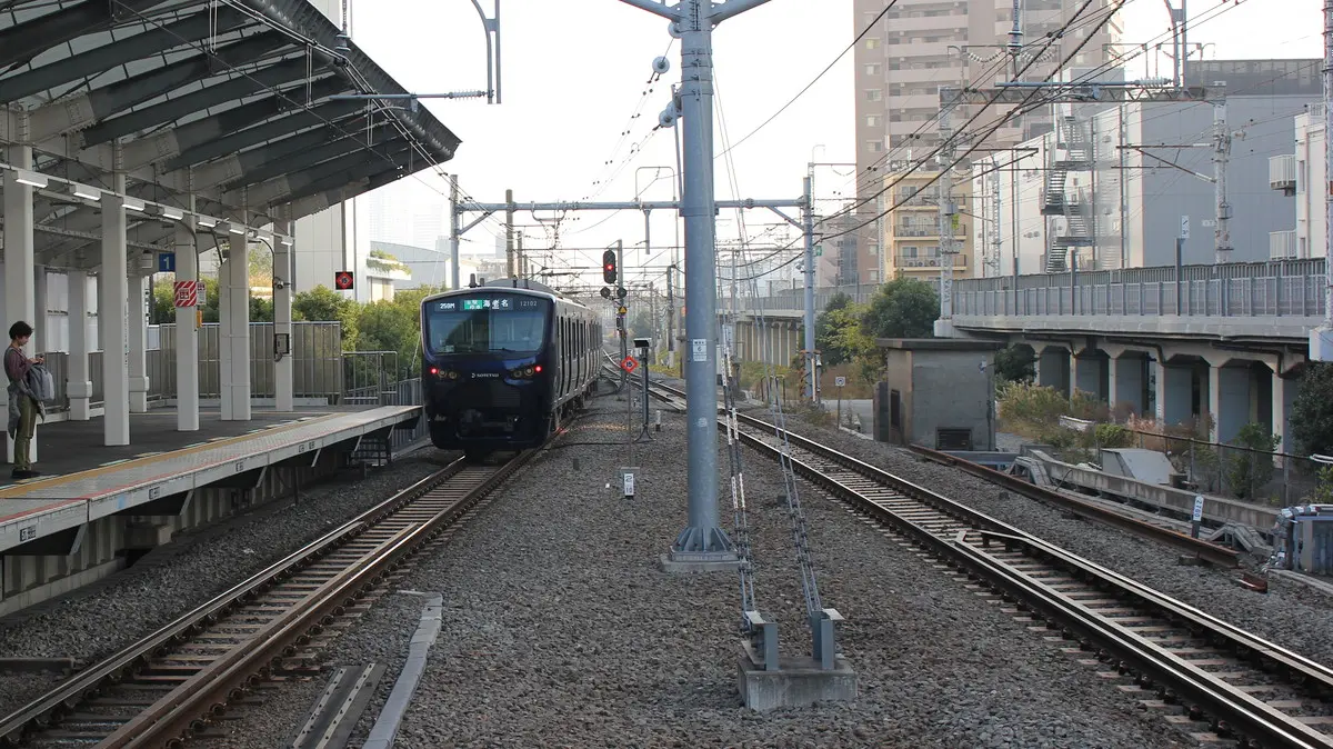 Sotetsu-JR Direct Line 12000 series train departing from Musashi-Kosugi Station